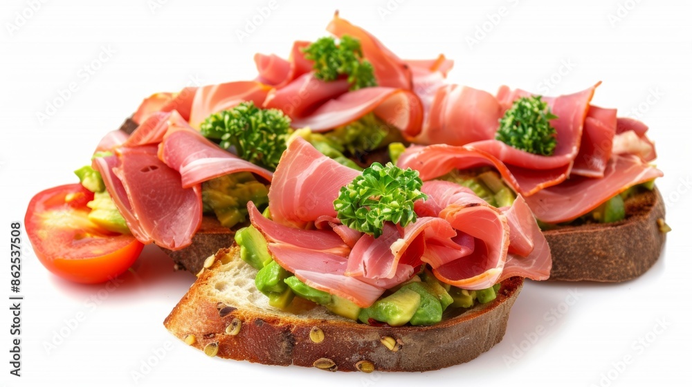 Fresh avocado toast with ham and tomato on a white background Fresh avocado toast with ham and tomato on a white background