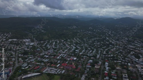 Brissy Brisbane Australia  aerial drone blue sky grey cloudy morning summer autumn winter Aussie neighborhood home buildings street cars Glass House Mountains forward motion photo