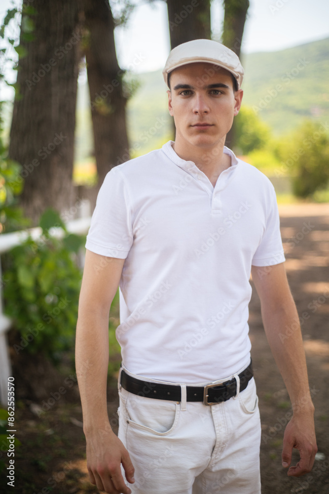 Portrait of a young man with a hat outdoor