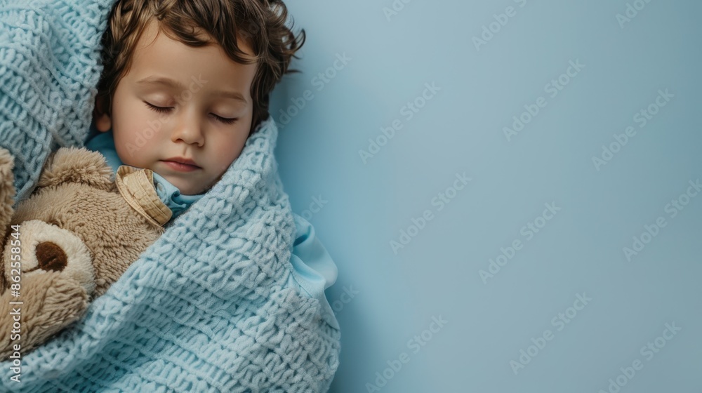 Sweet Dreams - Child Sleeping with Teddy Bear on Light Blue Blanket Copy Space for Text Sweet Dreams - Child Sleeping with Teddy Bear on Light Blue Blanket Copy Space for Text