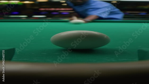 Wallpaper Mural Vertical stab shot of concentrated young Black man counting trajectory while aiming at snooker ball playing at pub Torontodigital.ca