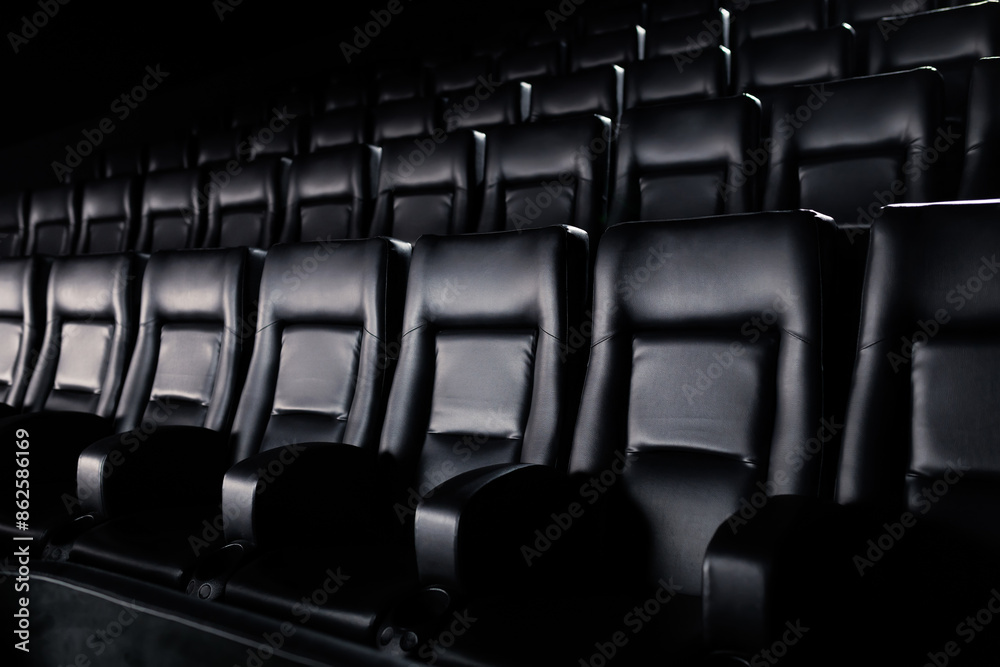 Fototapeta premium Close-up of stylish leather seats in the cinema. Cinema hall before the start of the session