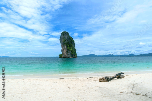 The beautiful landscape of Koh Poda,  Krabi, south of Thailand. Poda island, beautiful idyllic seascape with old timber on white sand beach surrounded by crystal clear water and blue sky. photo