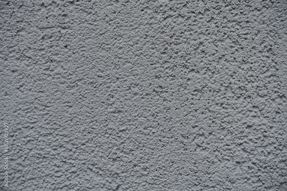 Macro of gray wall with coarse roughcast finish Macro of gray wall with coarse roughcast finish