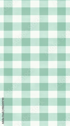 A close-up view of a seafoam green and white plaid wallpaper background. The texture of the fabric is visible, creating a soft and subtle pattern