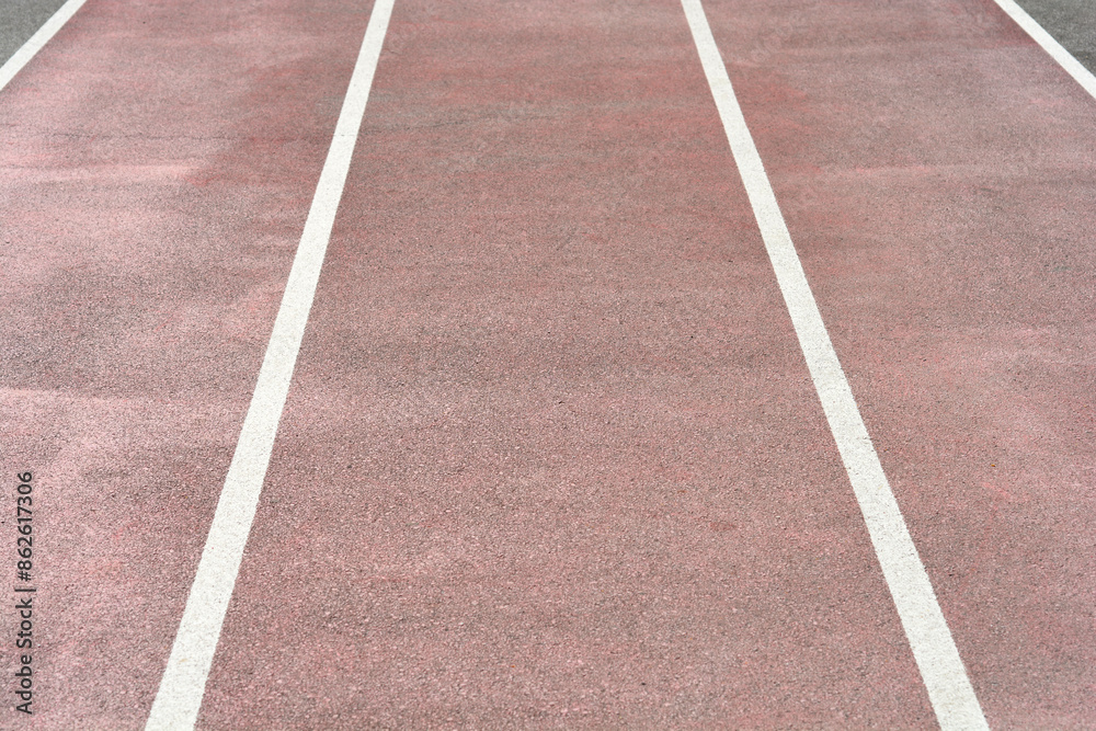 Fototapeta premium Detail of the running track on a school sports field
