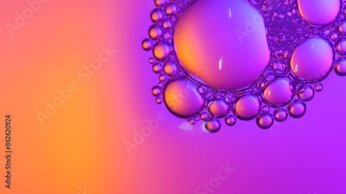 Top view pink soap bubbles floating on the water, color light background