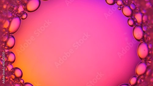Top view pink soap bubbles floating on the water, color light background