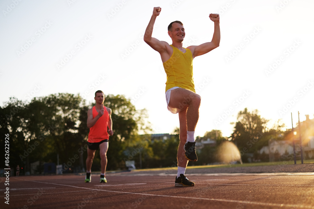 Portrait of a winning athlete in a race at the stadium Portrait of a winning athlete in a race at the stadium