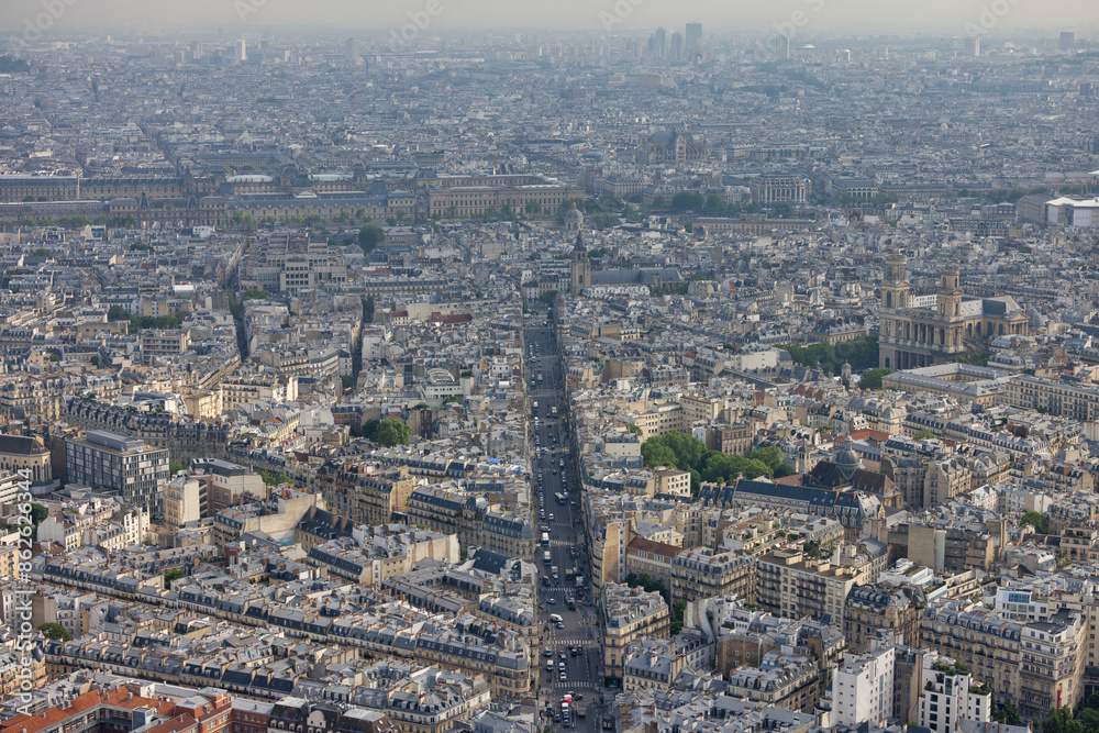 Aerial view of historic Paris city center with famous Eiffel Tower and Seine River, Ile de France, France. Aerial view of historic Paris city center with famous Eiffel Tower and Seine River, Ile de France, France.