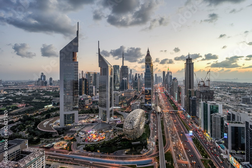 Dubai, Sheikh Zayed Road, United Arab Emirates - 15 December 2023: Aerial view of bustling city lights at evening in Dubai, Sheikh Zayed Road, United Arab Emirates.