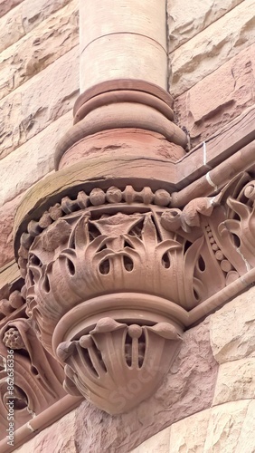 Colonial Romanesque Revival architectural details in Old City Hall, a heritage building and landmark in Toronto, Canada