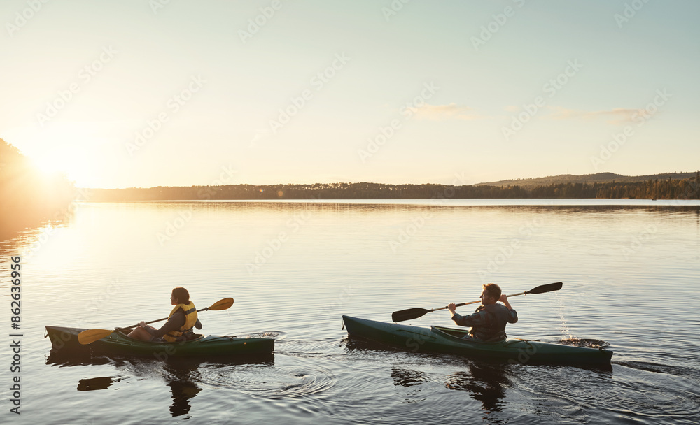 Couple, kayak and rowing at lake, sunrise and adventure with mockup space for holiday, fitness or nature. People, man and woman in boat on vacation in sunshine, morning and water sports in Italy Couple, kayak and rowing at lake, sunrise and adventure with mockup space for holiday, fitness or nature. People, man and woman in boat on vacation in sunshine, morning and water sports in Italy