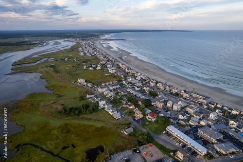 Aerial view of serene beach neighborhood with marsh and wetlands, Wells Beach, Maine, United States. photo