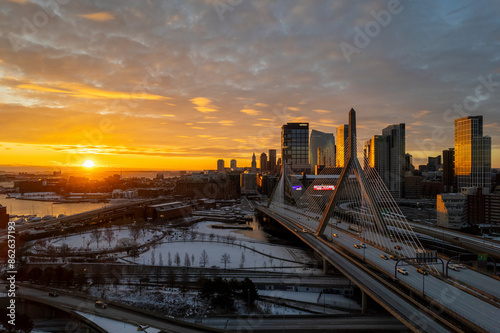 Aerial view of modern cityscape at sunset with bridge and skyscraper, Charlestown, Massachusetts, United States. photo