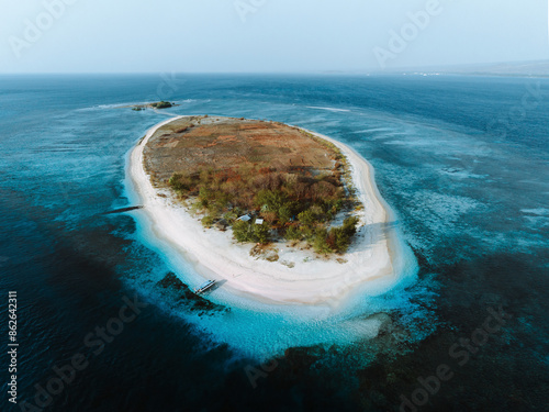 Aerial view of remote Gili Kapal island with turquoise waters and white sand beaches, Lombok, Indonesia. photo