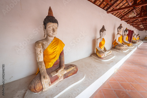 Old Buddha statue at Wat Aranyikawas, Ratchaburi, Thailand photo