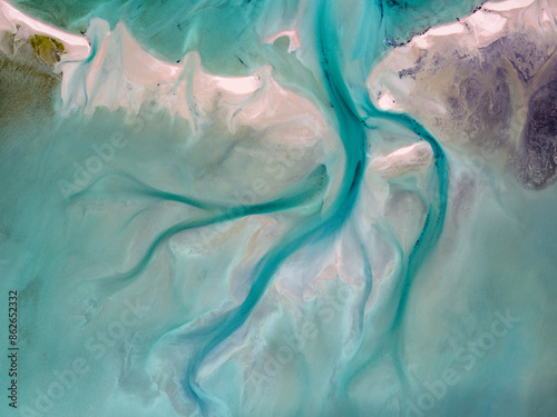 Aerial view of clear turquoise river and coastal sandbar, Shark Bay, Western Australia, Australia. photo