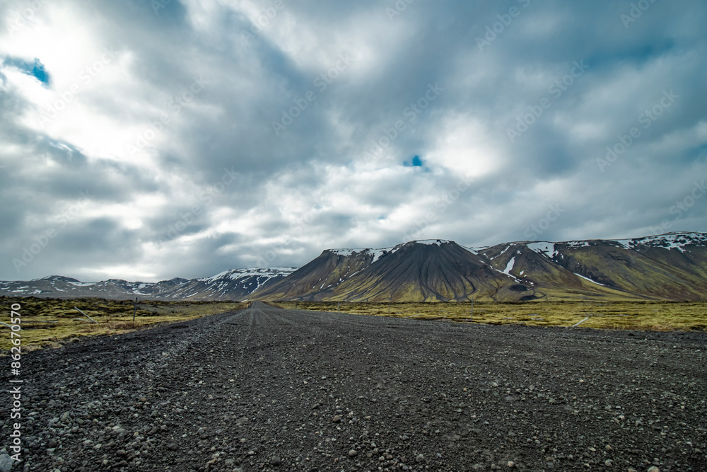 View of snow capped peaks and dramatic sky, leidarendi, iceland. View of snow capped peaks and dramatic sky, leidarendi, iceland.