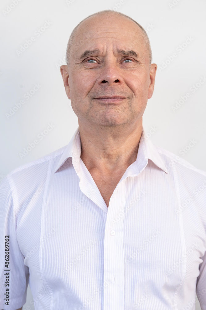 Obraz premium Elderly man, 65, senior thinks, doubts, physical and mental health, active lifestyle, life crisis, feeling down