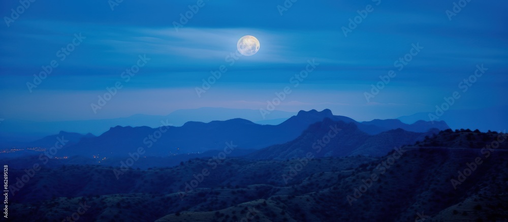 Fototapeta premium Moonlit Mountainscape