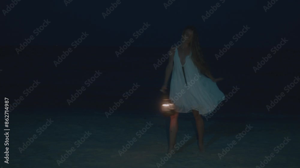 A woman moves like a ballerina on the beach at night, holding a lantern with a dreamy and mysterious atmosphere A woman moves like a ballerina on the beach at night, holding a lantern with a dreamy and mysterious atmosphere