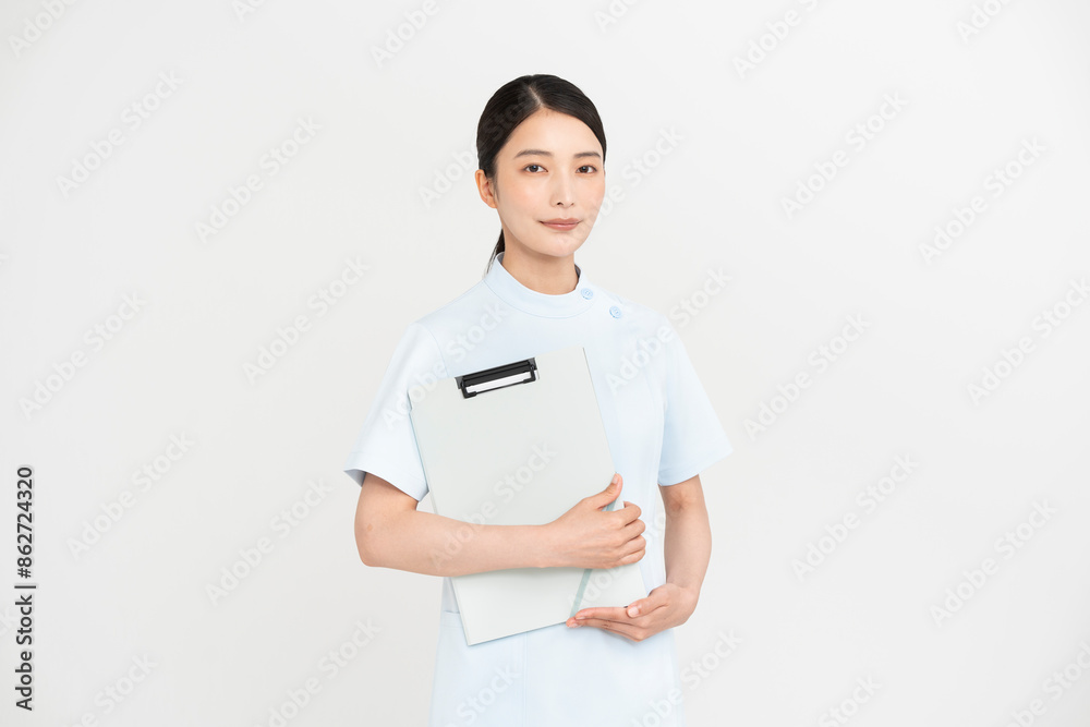 ケーシーを着ている女性/医療従事者
