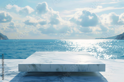 a marble square table with water in the background