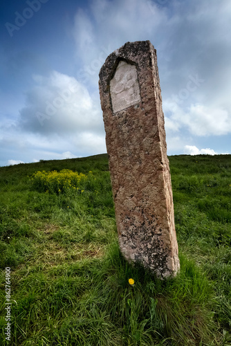 Obraz na płótnie Religious stone with bas-relief among the pastures of Lessinia. Velo Veronese, Veneto, Italy. w salonie