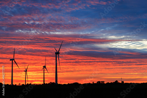 Wind turbines at sunset