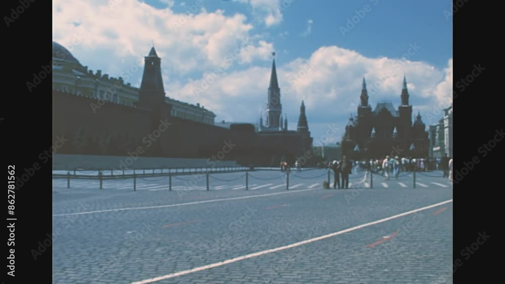 Moscow, Russia - 1985: Red Square with Kremlin complex, Senatskaja tower, and Nikolskaya tower. The State Historical Museum and the GUM State Department Store. Archival of Russia in Moscow in 1980s.
