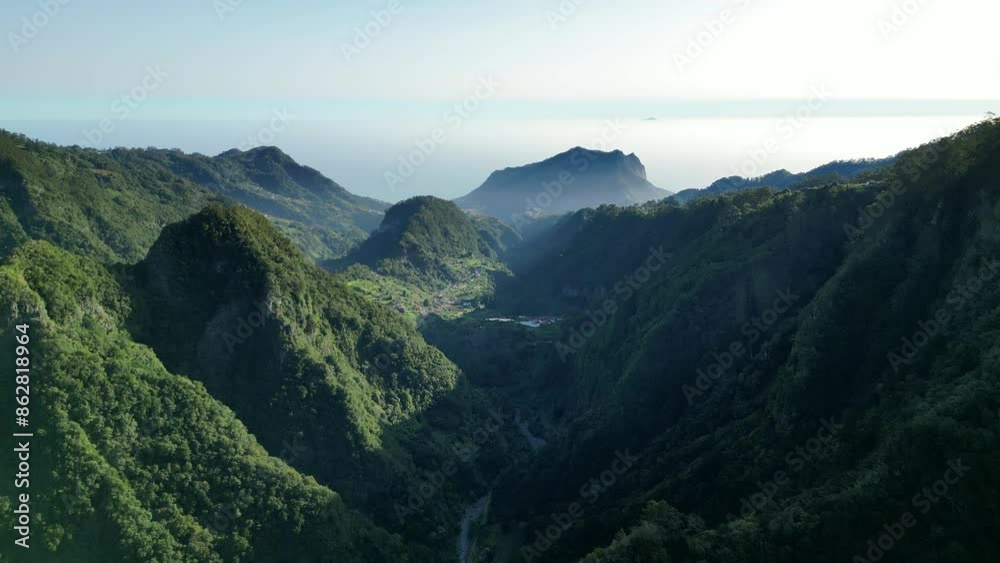 Aerial view of lush valley in morning light, Levada dos Balcoes, Madeira, Portugal. Aerial view of lush valley in morning light, Levada dos Balcoes, Madeira, Portugal.