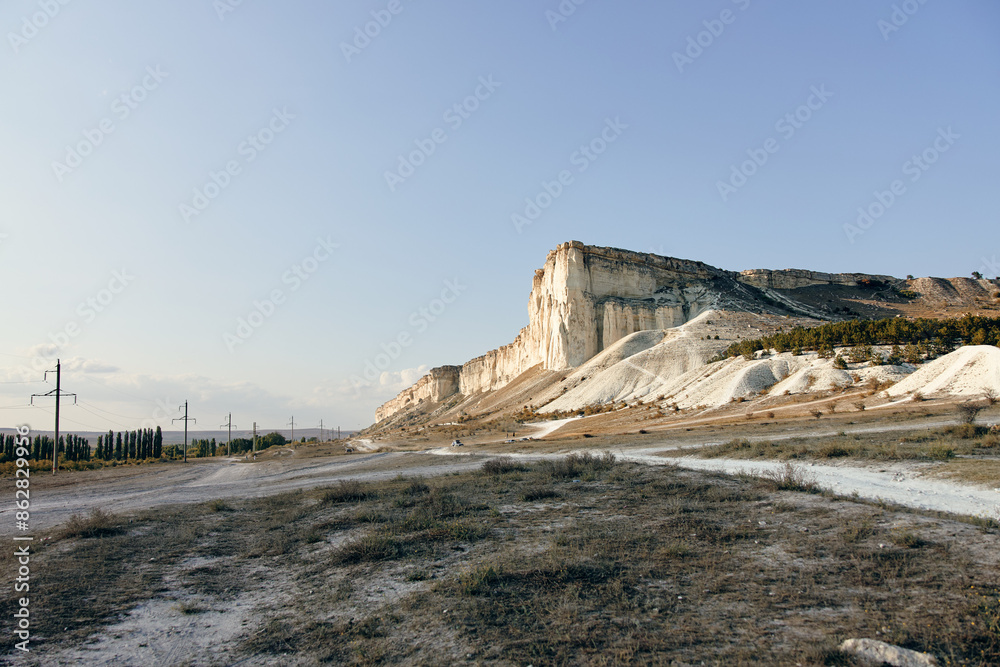 tranquil blue sky with sunlight streaming through, perfect for nature backgrounds and copy space