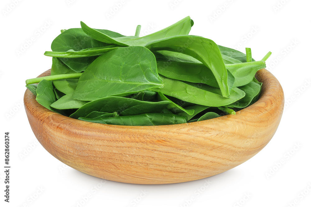 Baby spinach leaves in wooden bowl isolated on white background Baby spinach leaves in wooden bowl isolated on white background