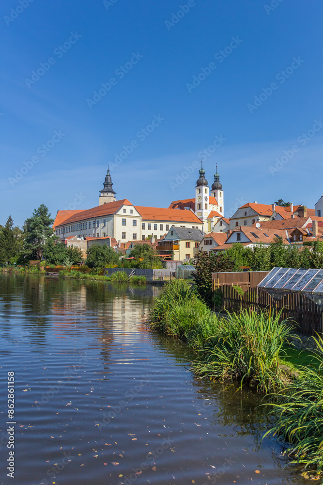 Historic castle at the lake in Telc, Czechia Historic castle at the lake in Telc, Czechia