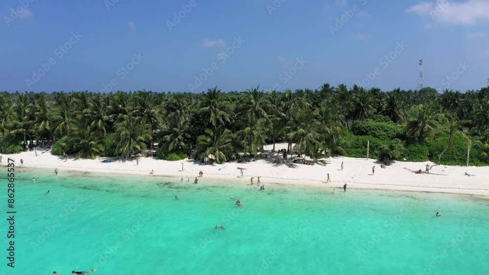 Aerial view of tropical paradise with white sand beach and turquoise ocean, Thoddoo Atoll, Maldives. Aerial view of tropical paradise with white sand beach and turquoise ocean, Thoddoo Atoll, Maldives.