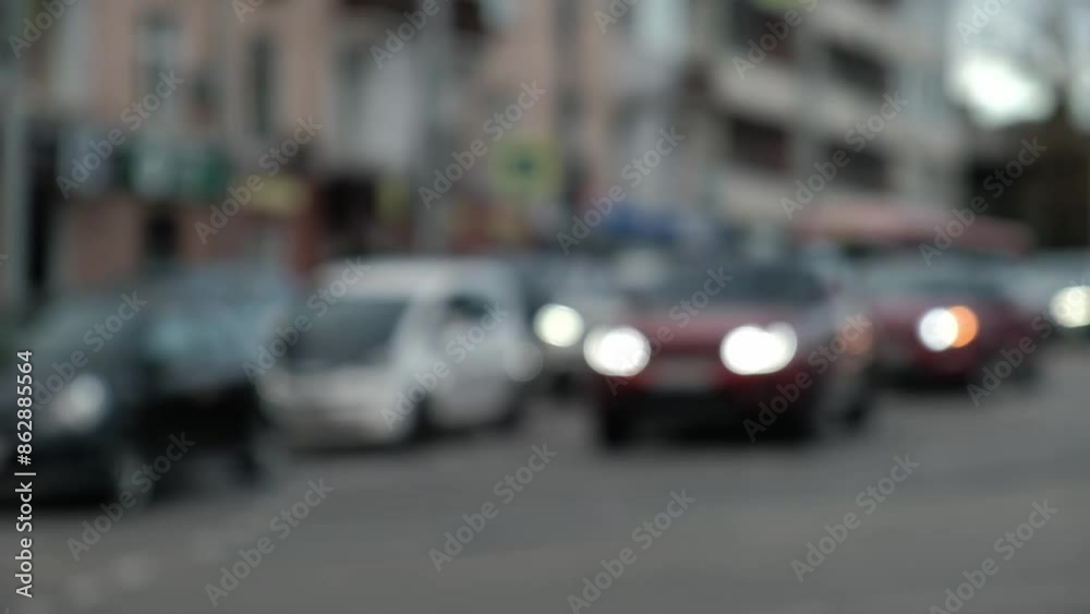 unfocused cars, buses are driving on the roads of the city highway. blurred busy transport interchange of the evening city. urban traffic. slow motion. unfocused cars, buses are driving on the roads of the city highway. blurred busy transport interchange of the evening city. urban traffic. slow motion.