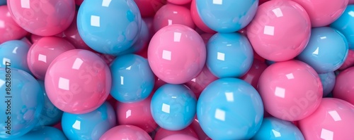 Colorful close-up of pink and blue plastic balls in a playful background photo