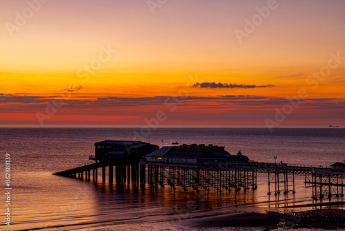 Breaking dawn at Cromer Pier © David