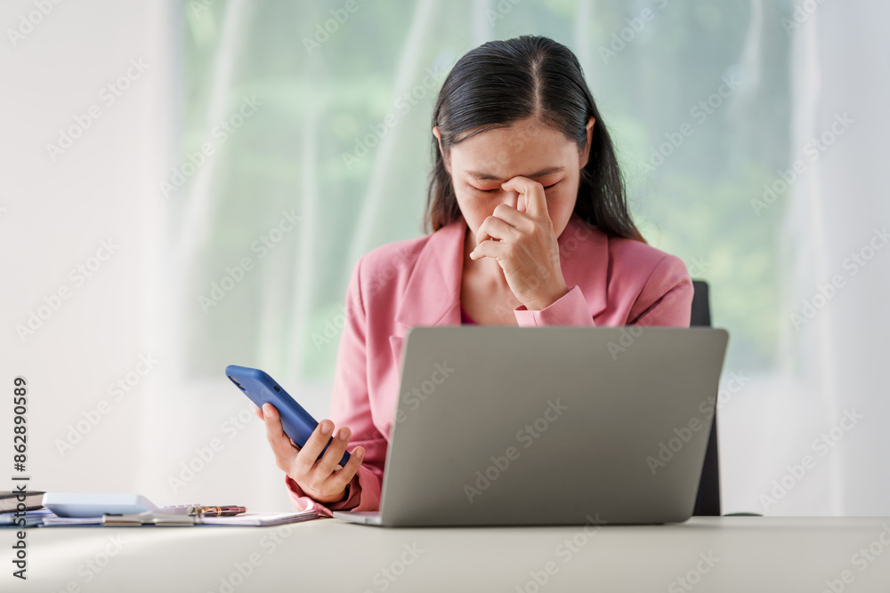 40-year-old middle-aged Asian businesswoman wearing pink suit, business finance, investment strategies, risk management. Skilled in planning, analysis, operations control for business success. 40-year-old middle-aged Asian businesswoman wearing pink suit, business finance, investment strategies, risk management. Skilled in planning, analysis, operations control for business success.