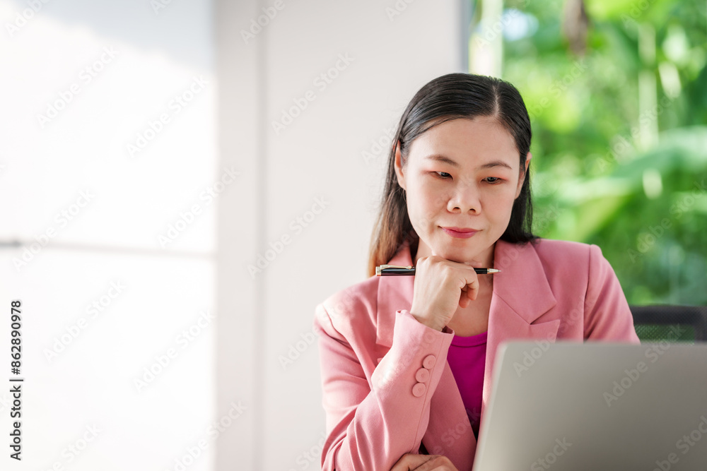 40-year-old middle-aged Asian businesswoman wearing pink suit, business finance, investment strategies, risk management. Skilled in planning, analysis, operations control for business success. 40-year-old middle-aged Asian businesswoman wearing pink suit, business finance, investment strategies, risk management. Skilled in planning, analysis, operations control for business success.