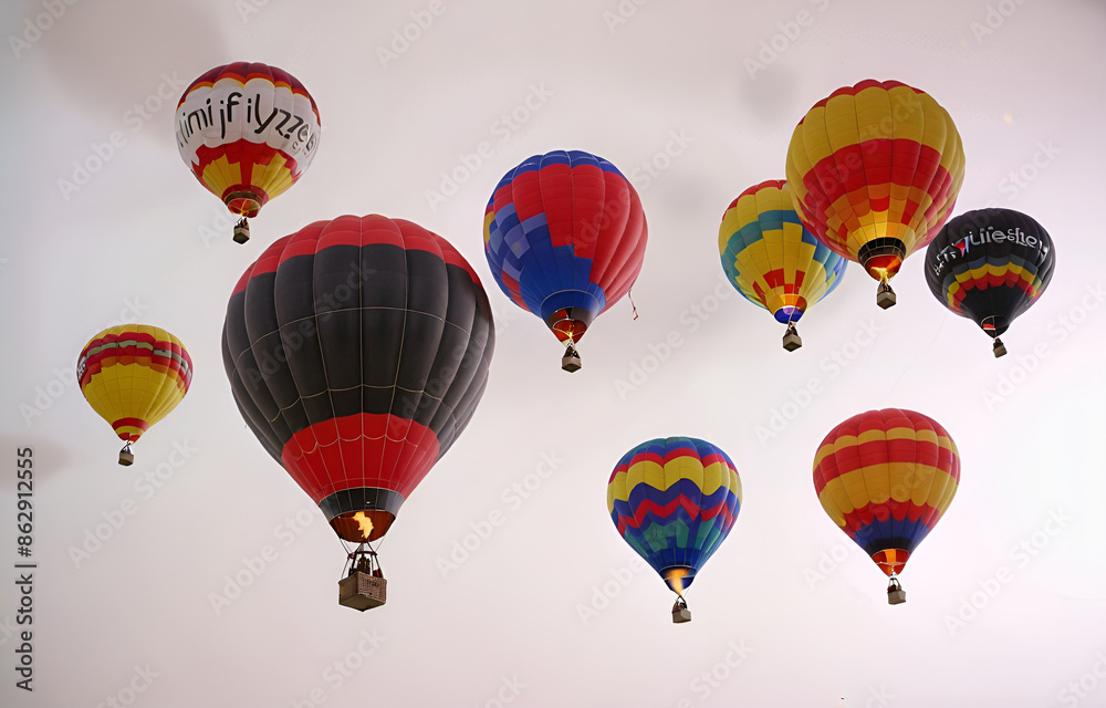 Fototapeta premium a colorful hot air balloon grounded on a ,white background,beauty