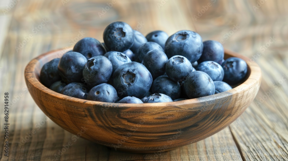 Blueberries in wooden bowl for healthy dieting Blueberries in wooden bowl for healthy dieting