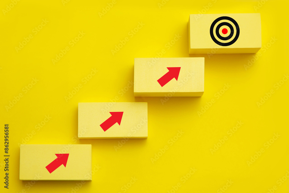Step to Achievement; Business growth and business goal concept; Target symbol on the top of stair Step to Achievement; Business growth and business goal concept; Target symbol on the top of stair