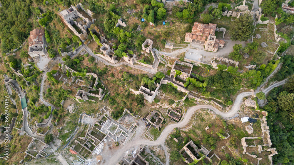 Fototapeta premium Aerial panoramic view of Sparta city with Taygetus mountains and ancient ruins remains in Peloponnese, Greece