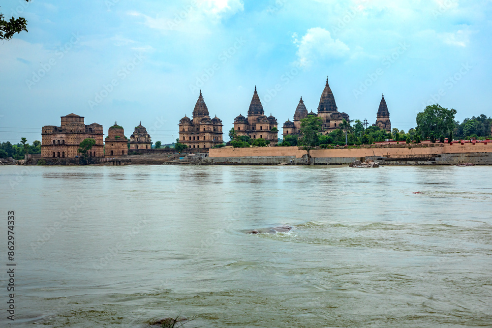 Naklejka premium Royal Chhatris or Cenotaphs are the historical monuments situated on the banks of River Betwa in Orchha, Madhya Pradesh, India.