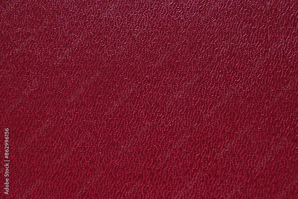 Fototapeta premium Maroon color grainy fine leather texture as background