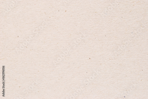 A sheet of beige recycled cardboard texture as background