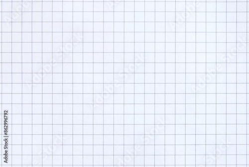 A sheet of math grid paper, graph paper texture as background