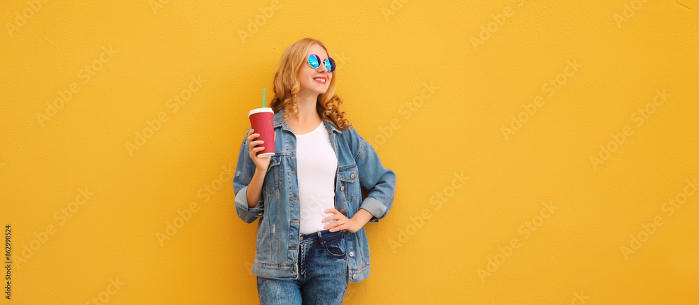 Summer joyful young woman with cup of coffee, stylish modern girl holding juice in casual clothes Summer joyful young woman with cup of coffee, stylish modern girl holding juice in casual clothes